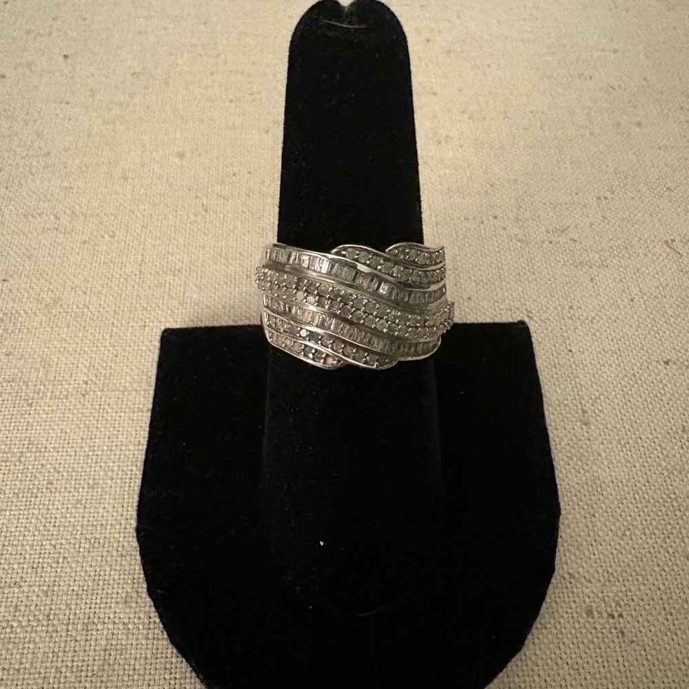 Elegant Sterling Silver Diamond & Baguette Wave Ring